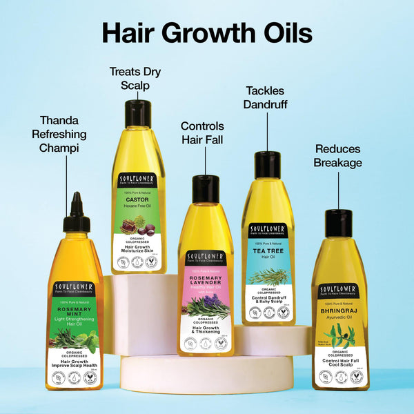 Combo pack of Soulflower Hair Growth Oils displayed on podiums, featuring Rosemary for cooling champi, Castor for dry scalp, Rosemary Lavender for hair fall control, Tea Tree for dandruff, and Bhringraj for breakage reduction – perfect hair care combo for all scalp needs.