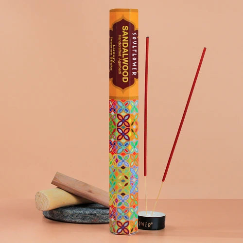Handcrafted sandalwood incense sticks with calming aroma, perfect for festive puja rituals and spiritual ambiance.