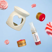 Soulflower Aroma Gift Set featuring a ceramic aroma diffuser, Aroma Candy oil, and decorative scented candles.