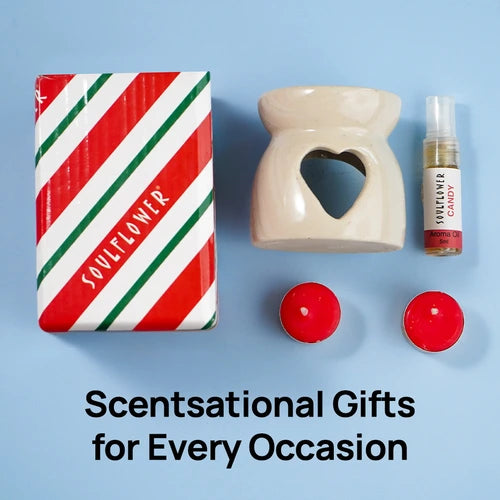 Soulflower Aroma Gift Set with a festive box, aroma diffuser, red candles, and Candy Aroma Oil spray, ideal for every occasion.