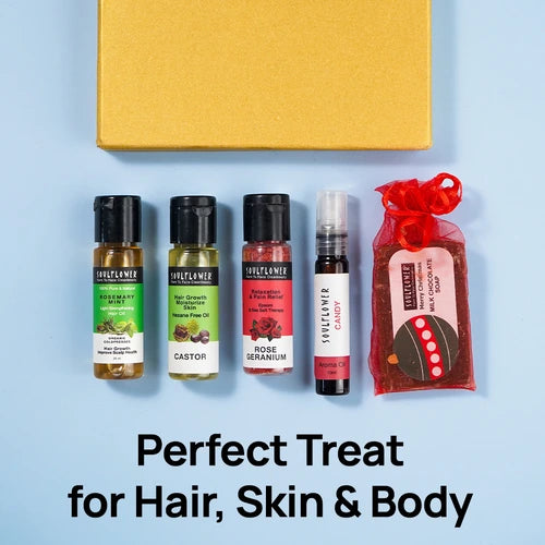 Soulflower Surprise Gift Box with hair oils, bath salt, aroma oil, and chocolate soap for hair, skin, and body.