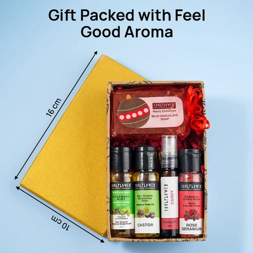 A gift box containing Soulflower essential oils (Castor, Lavender, Tea Tree, Rose Geranium) and a chocolate soap, labeled 'Gift Packed with Feel Good Aroma.