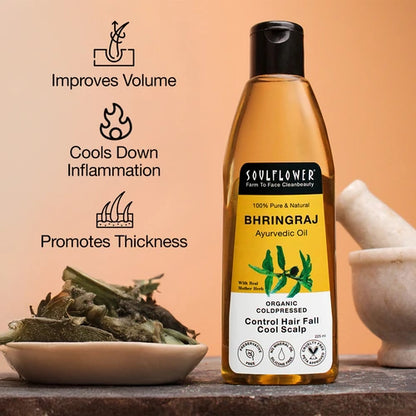 Bhringraj Hair Growth Oil made with natural Bhringraj, coconut, and sesame oils for thick, strong, and healthy hair.