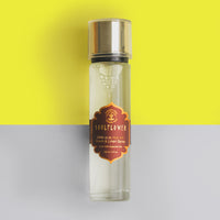 Sweet, floral, and exotic linen spray with essential oils to refresh spaces and create a romantic, calming atmosphere.