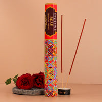 Handcrafted rose incense sticks with a sweet, spiritual aroma for festive puja rituals.